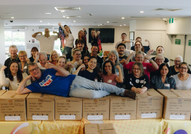 It's a packing day for Supertee, which brought club members and staff volunteers together.